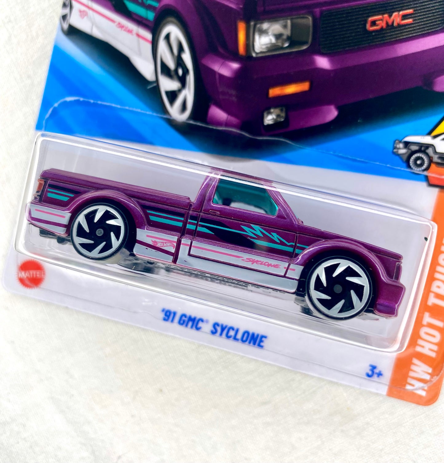 Hot Wheels ’91 GMC Syclone – HW Hot Trucks – 8/10 – Purple/Teal Lightning – Mint on Card
